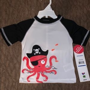 Size 18 months bathing suit top for boy.